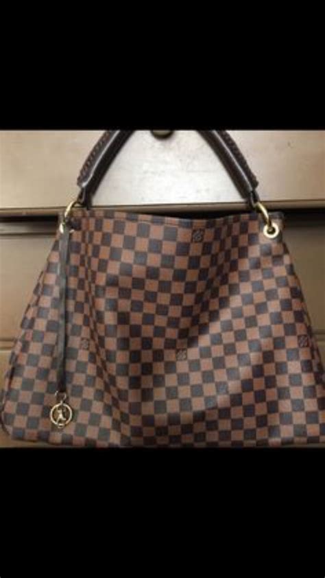 lv artsy damier ebene|damier ebene logo.